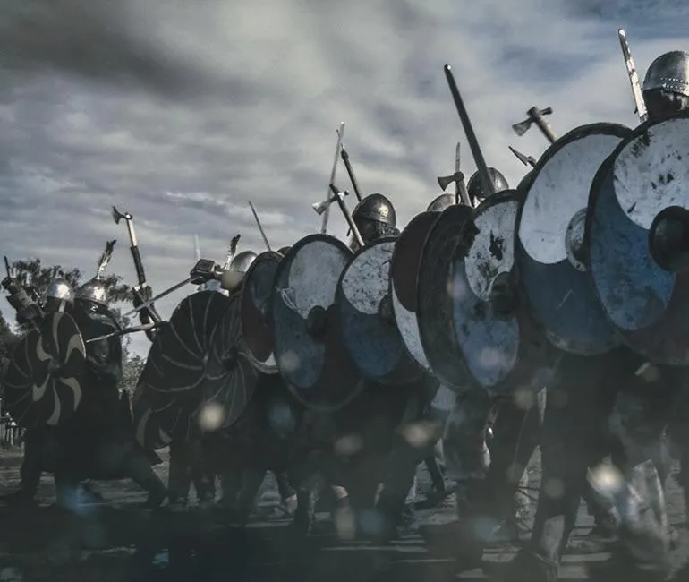 A hot day – and heavily-armoured troops march past