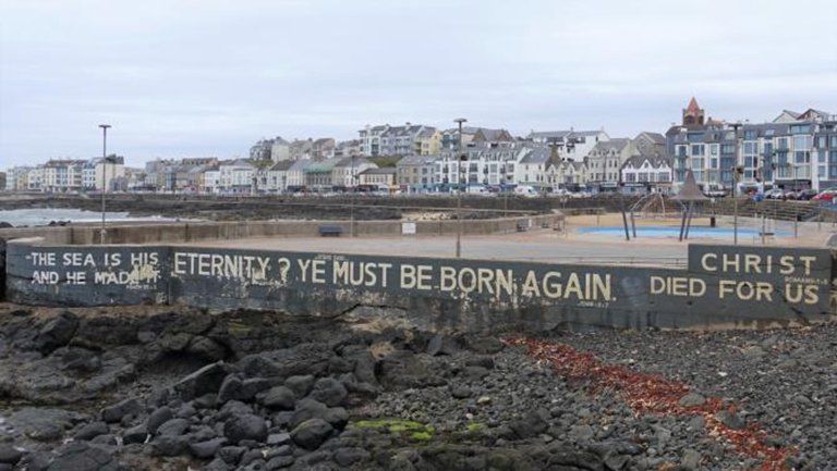 Seawall Scripture row grows